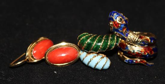 A pair of 18ct gold and coral earrings and two enamelled rings.